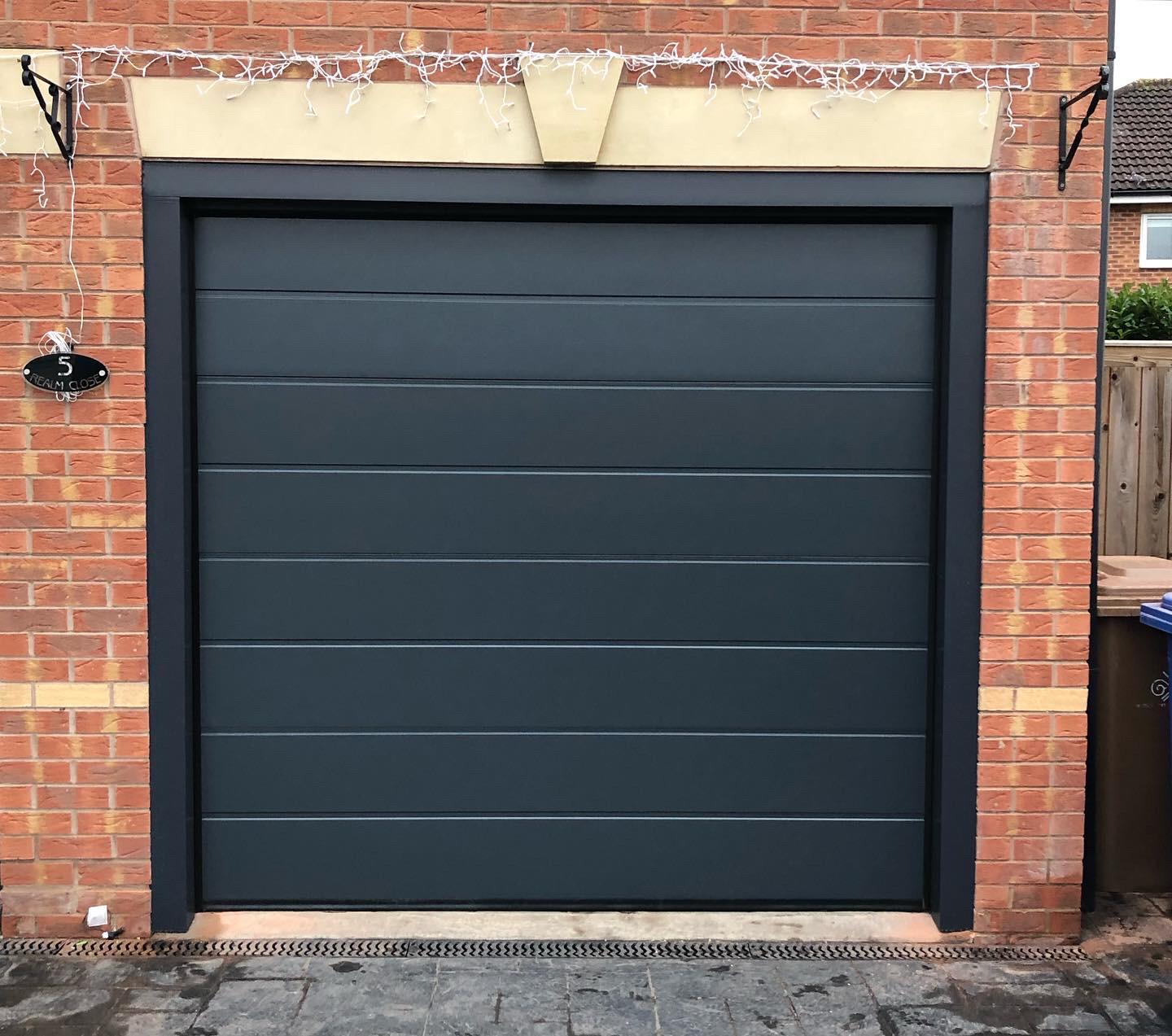 Black New Sectional Garage Door